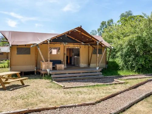 Gruppenunterkunft mit 7 Lodges mit eigener Veranda